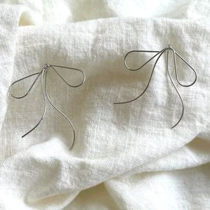 Hollow Silver Metal Bow Design Dangle Earrings Elegant Simple Style Minimalist